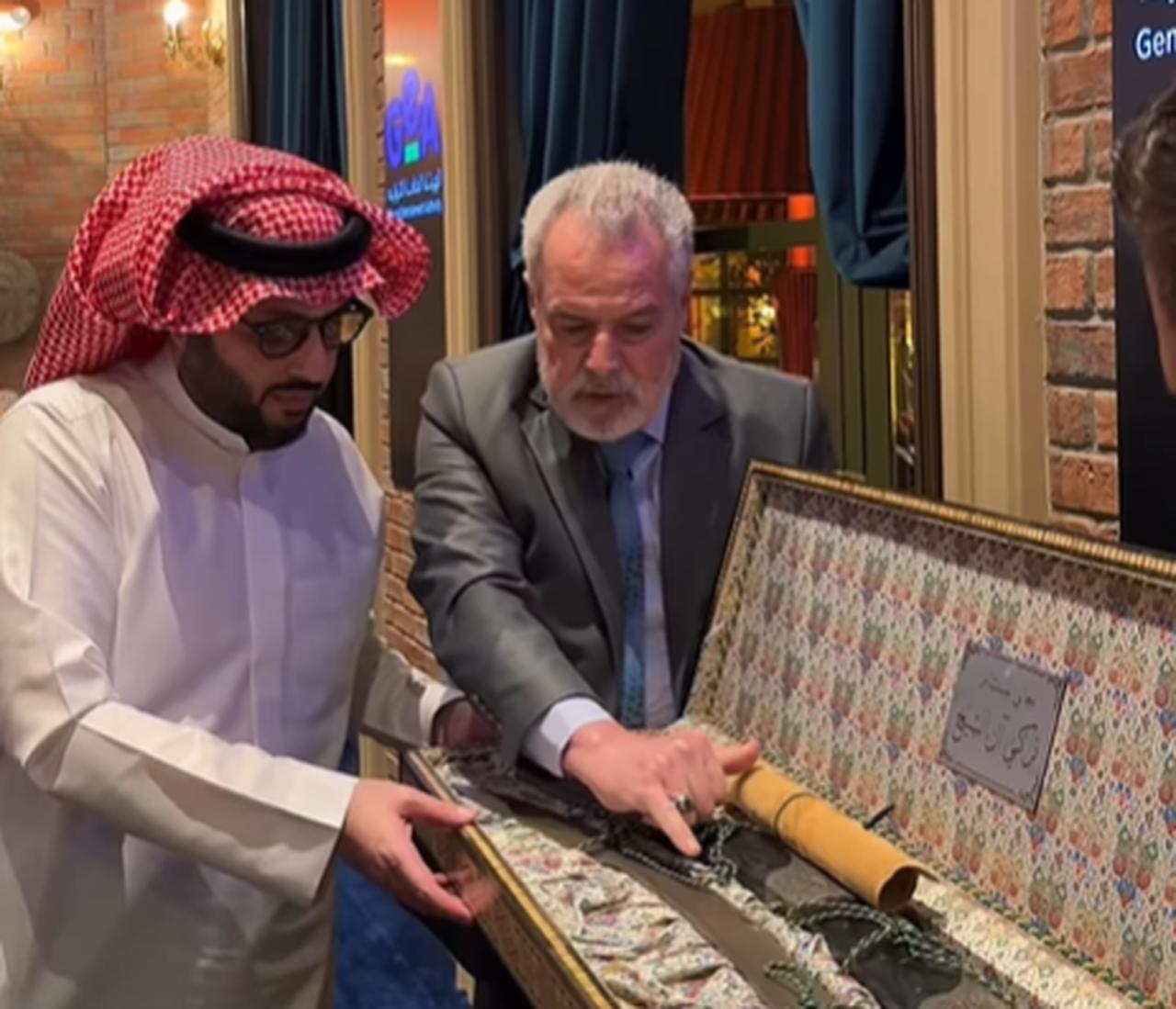 Saudi entertainment chief Turki Al-Sheikh receives gift from last Damascus swordsmith , on November 8 , 2025 . ( Photo via Instgram / @TURKI ALALSHIKH )
