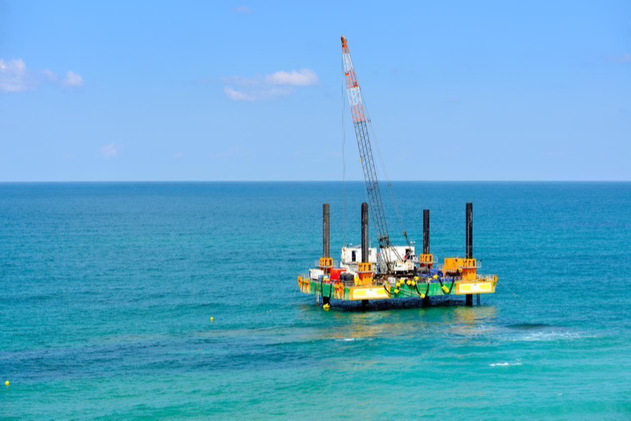Aerial view of a floating offshore drilling platform stationed in the Mediterranean Sea. (Adobe Stock Photo)