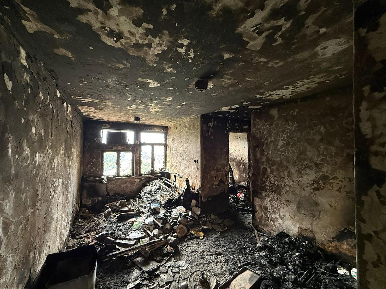 This photo, released by the Hong Kong Police Force on December 1, 2025, shows the aftermath of a fire in an apartment building at the Wang Fuk Court residential estate in Tai Po, Hong Kong. (AFP PHOTO / HONG KONG POLICE FORCE)