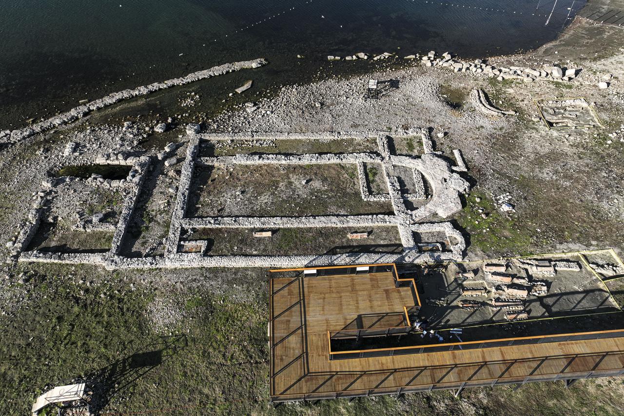 An aerial view of ruins of the Basilica of Saint Neophytos, also known as the "submerged basilica ruins", where Pope Leo XIV visited on November 28 in the Iznik district of Bursa, Türkiye, Nov. 27, 2025. (AA Photo)