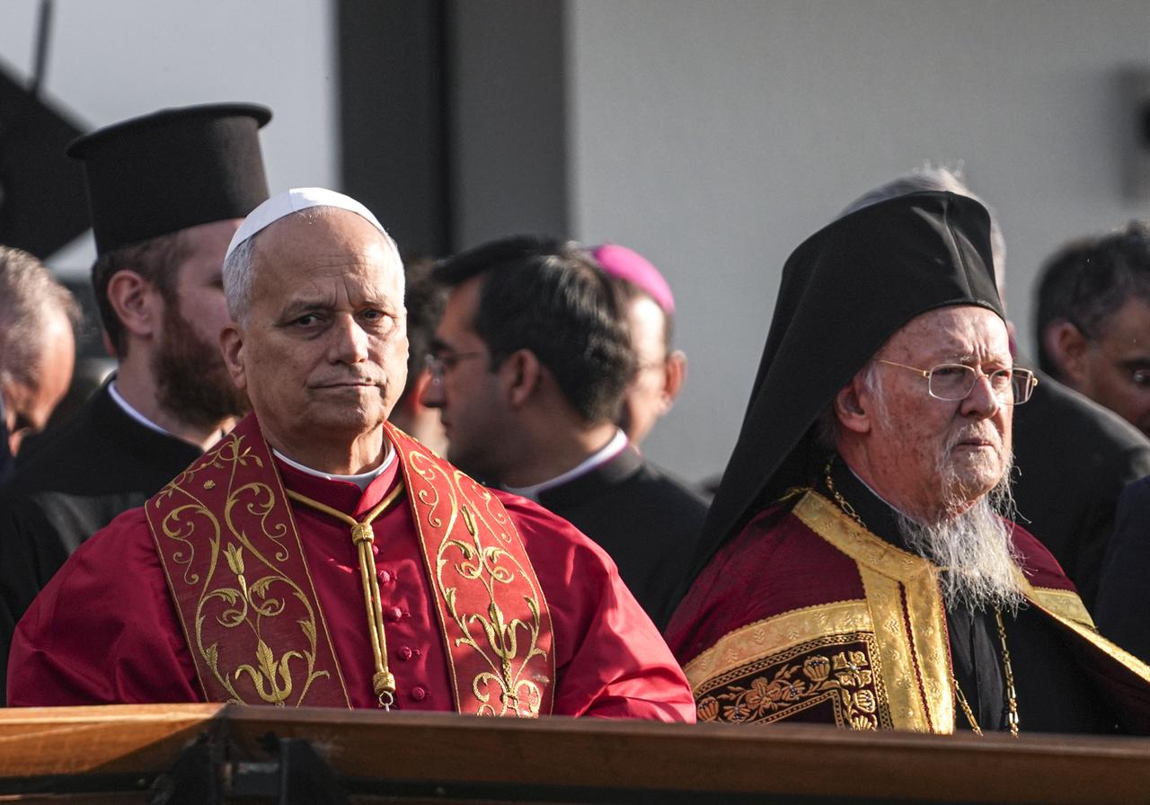 Pope Leo XIV (L) attends a ceremony marking the 1700th anniversary of the First Council of Nicaea held in the ruins of Basilica of Saint Neophytos, revealed in 2014 after water levels receded in Lake Iznik and identified as having been built in honor of Saint Neophytos in Bursa, Türkiye, Nov. 28, 2025─Fener Greek Patriarch Bartholomeos (R) also attended the event. (AA Photo)