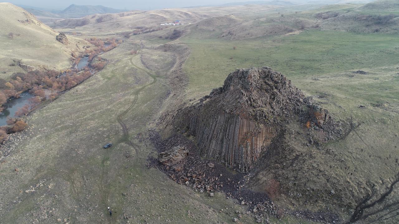 An aerial view of the volcanic basalt outcrop standing above the Kaynarca Creek Valley in Varto, Mus, Türkiye, Nov. 30, 2025. (AA Photo)