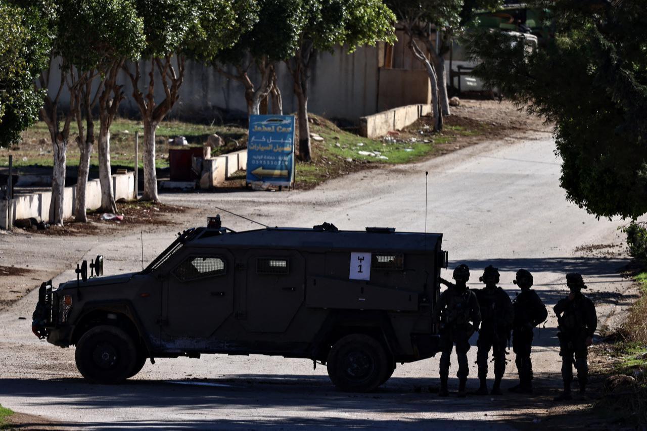 An Israeli military vehicle blocks the entrance to Tammun, south of Tubas in the occupied West Bank, during a military operation on Nov. 26, 2025. (AFP Photo)