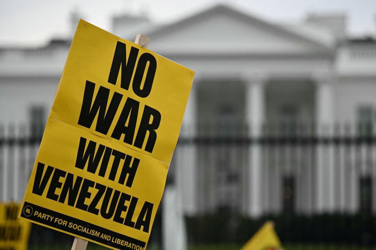 People take part in a Peace with Venezuela protest against the US military deployment in Latin America in front of the White House in Washington, DC, on Nov. 15, 2025. (AFP Photo)