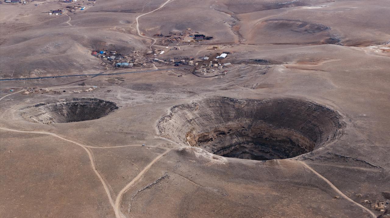 An aerial view of the sinkholes, located 300 meters west of the Buyuk Cirali Plateau, has dried up as water levels have declined in Konya, Türkiye, Dec. 5, 2025. (AA Photo)