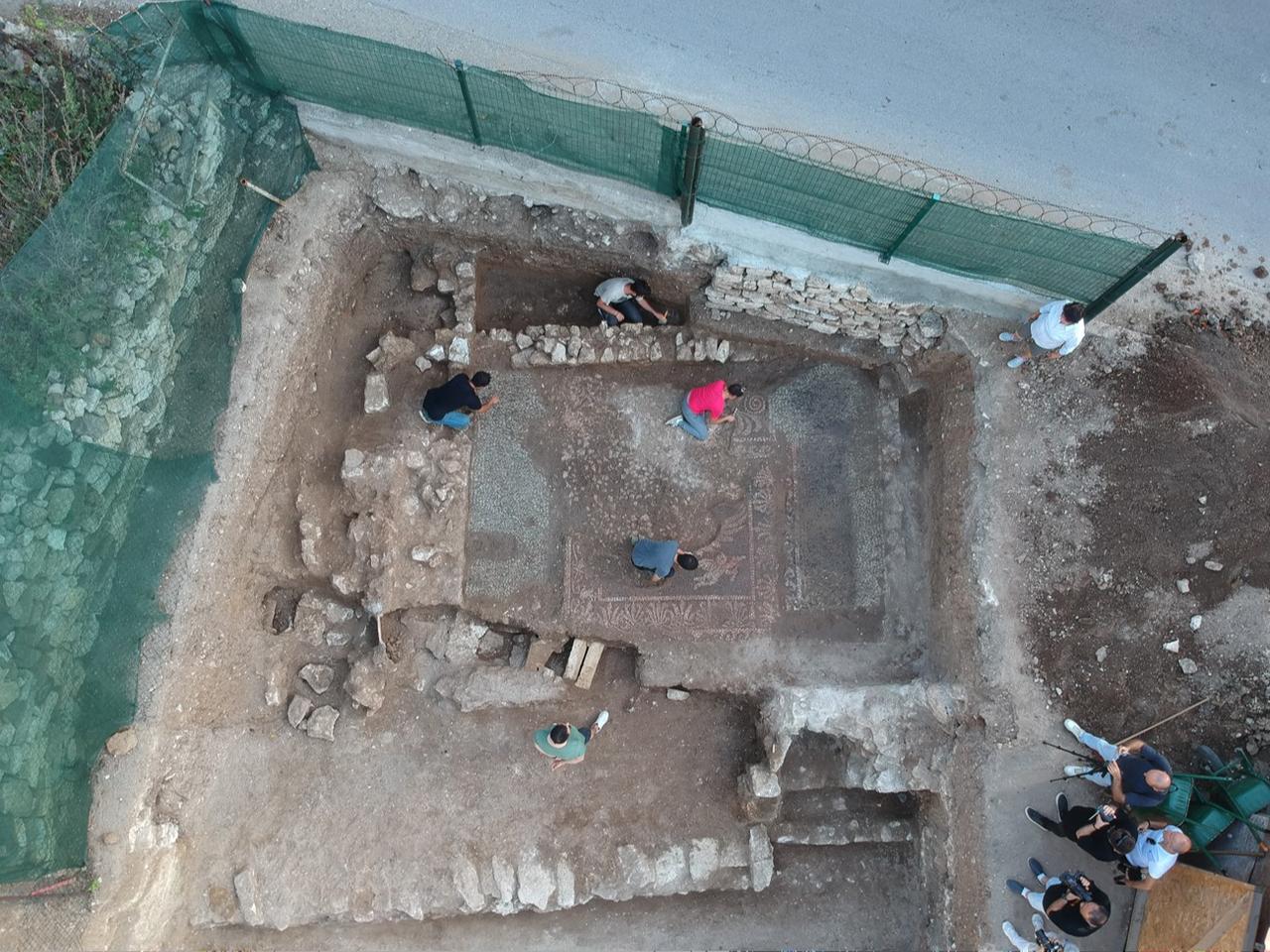 An aerial view of the Balatlar Church Complex excavation area surrounded by modern housing in Sinop, Türkiye, June 22, 2023. (IHA Photo)