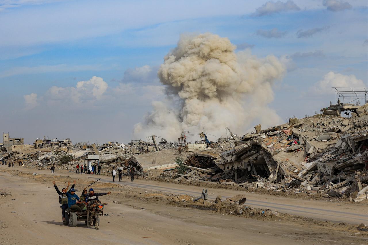 A massive smoke and dust cloud rises after Israeli forces demolish several buildings in the Shujaiyya neighborhood located inside the so-called yellow zone in northern Gaza City, Gaza, Dec. 9, 2025. (AA Photo)