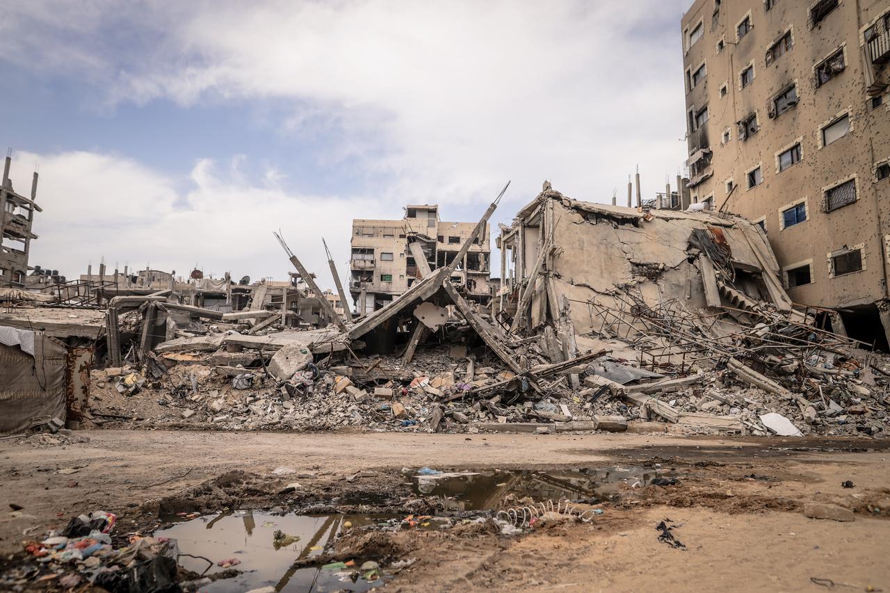 Palestinians maintain their daily lives amid the rubble left behind by Israeli attacks in the Sheikh Ridwan neighborhood of Gaza City, December 8, 2025. (AA Photo)