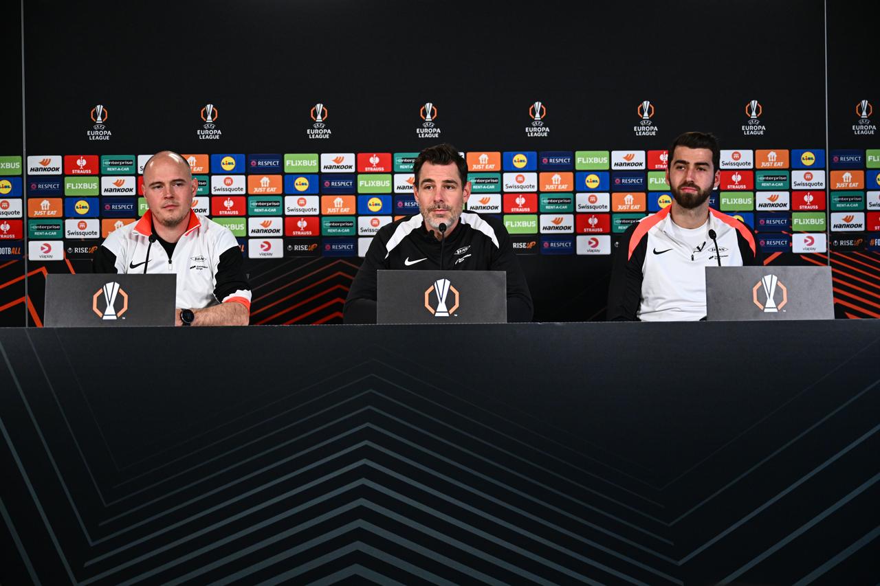 Head coach of Brann, Freyr Alexandersson (C) and Brann player Vetle Dragsnes (R) speak during a press conference at Brann Stadium ahead of their UEFA Europa League match day 6 between Brann and Fenerbahce, in Bergen, Norway, Dec. 10, 2025. (AA Photo)