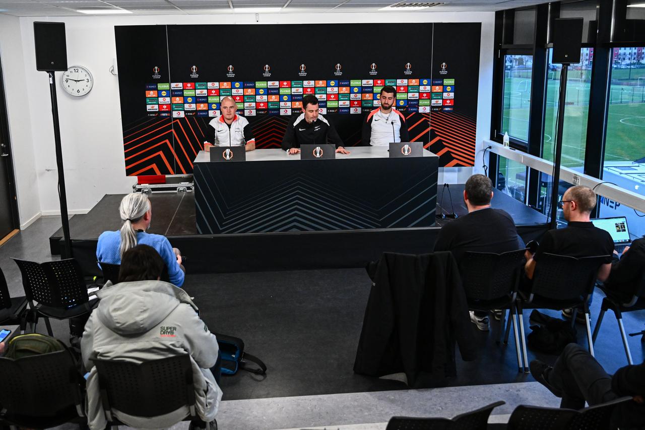 Head coach of Brann, Freyr Alexandersson (C) and Brann player Vetle Dragsnes (R) speak during a press conference at Brann Stadium ahead of their UEFA Europa League match day 6 between Brann and Fenerbahce, in Bergen, Norway, Dec. 10, 2025. (AA Photo)