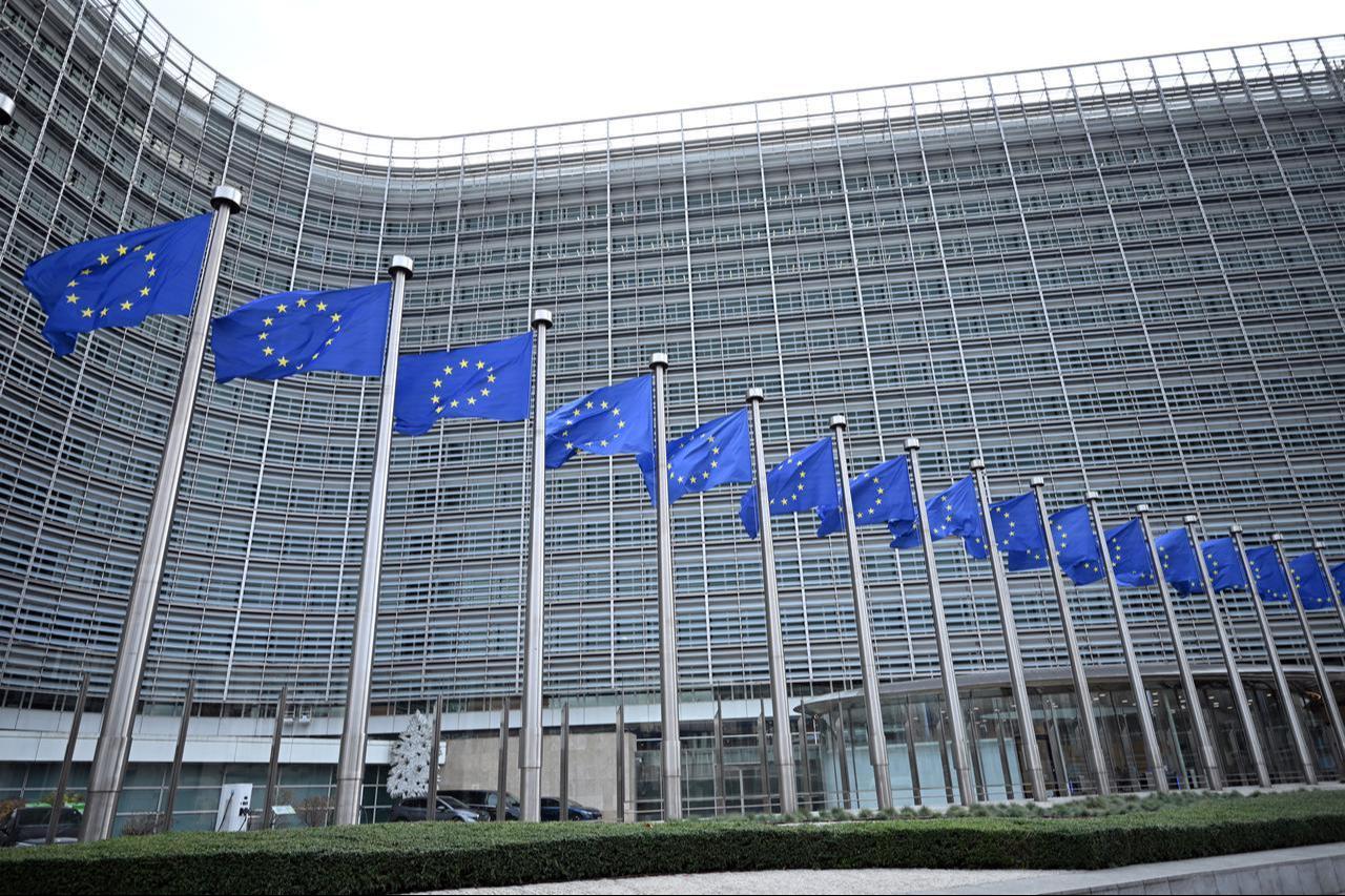 A view of the Berlaymont building and European Union flags in Brussels, Belgium, December 4, 2025. (AA Photo)