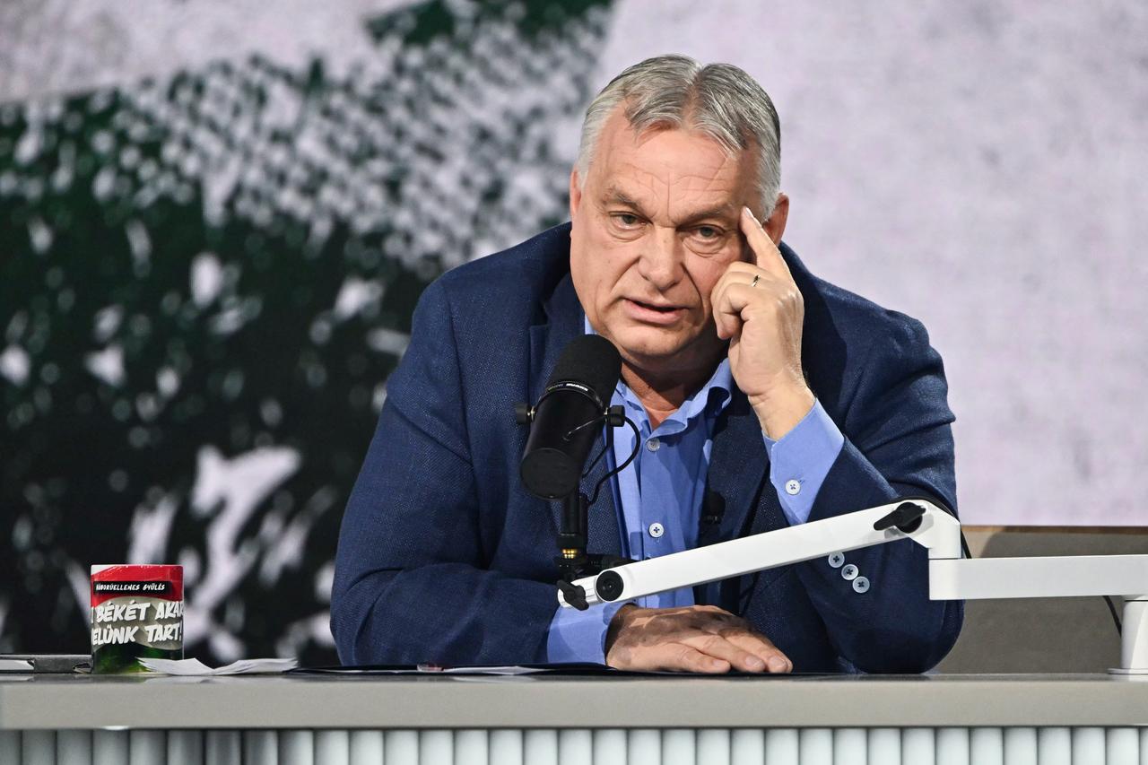 Hungarian Prime Minister and chairman of FIDESZ party Viktor Orban addresses supporters at the local sports hall of Kecskemet on December 6, 2025, during a meeting of the Digital Civic Circles. (AFP Photo)