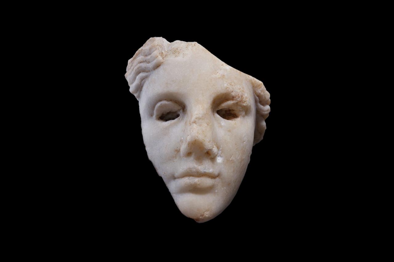 A front view of the marble goddess head, thought to belong to the Hellenistic period, discovered in the ancient city of Metropolis near Izmir, western Türkiye, Dec. 11, 2025. (AA Photo)