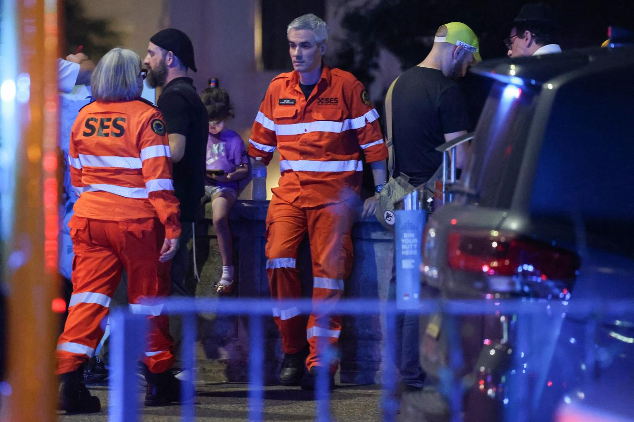 Emergency services workers are seen on a street after a shooting incident at Bondi Beach in Sydney, Australia on Dec. 14, 2025. (AFP Photo)