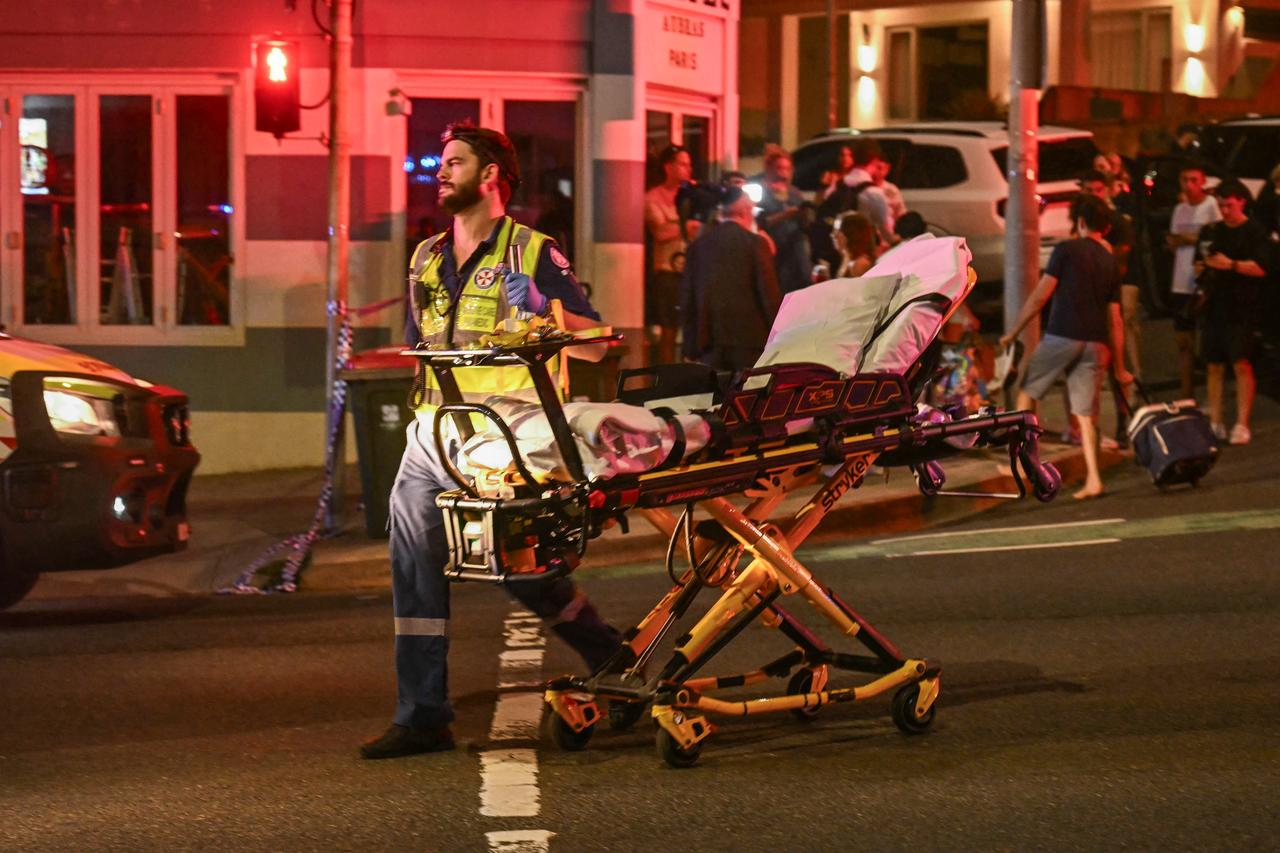 A health worker moves a stretcher after a shooting incident at Bondi Beach in Sydney, Australia on Dec. 14, 2025. (AFP Photo)