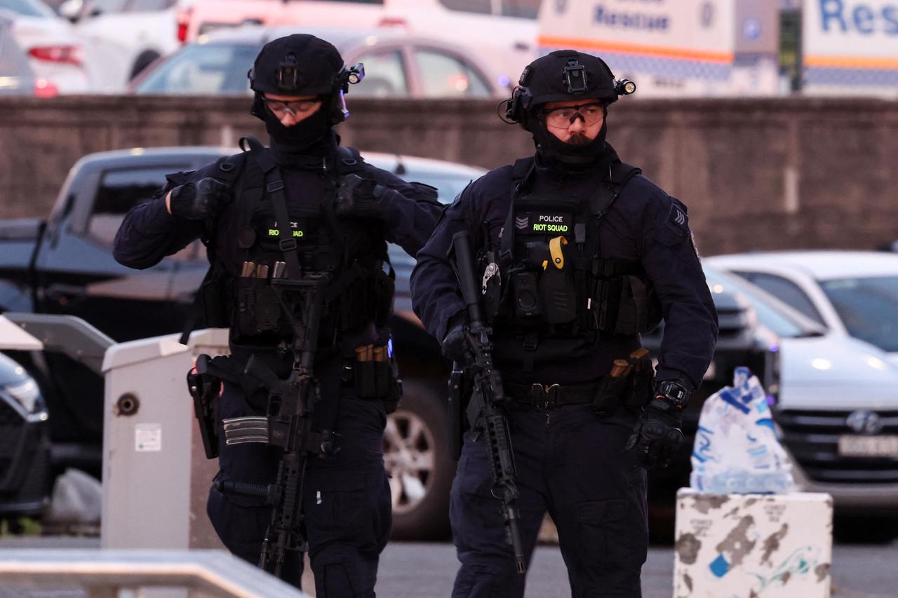 Father and son named as gunmen in deadly Sydney beach terror attack