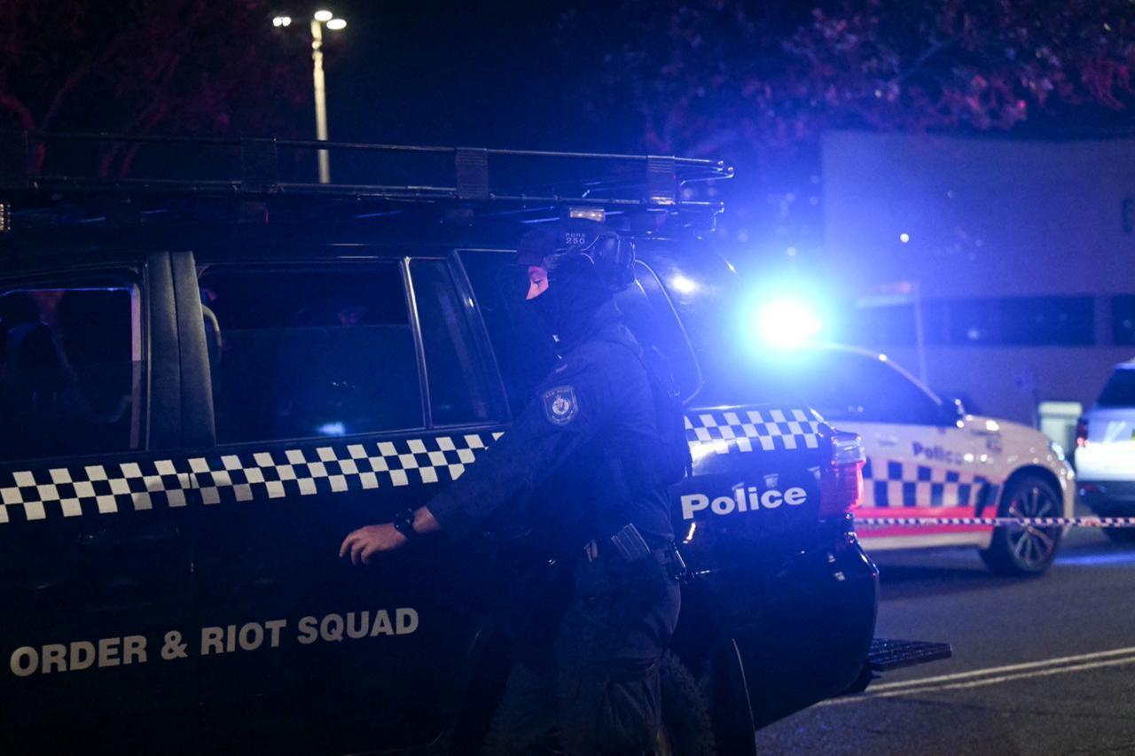 A policeman works at the scene after a shooting incident at Bondi Beach in Sydney on Dec. 14, 2025. (AFP Photo)