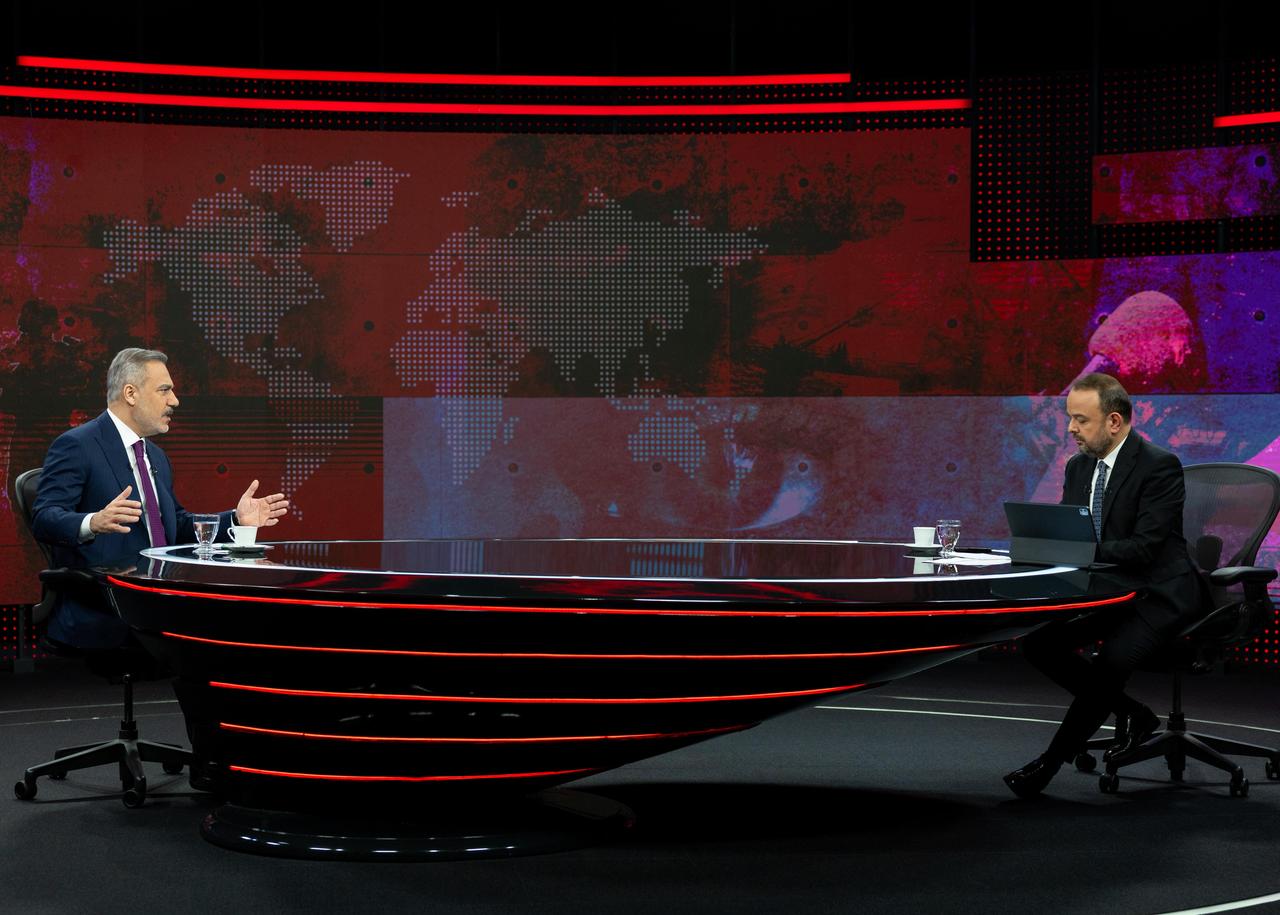 Foreign Minister Hakan Fidan answers questions on current issues during a live broadcast on TVNET in Istanbul, Türkiye on Dec. 13, 2025. (AA Photo)