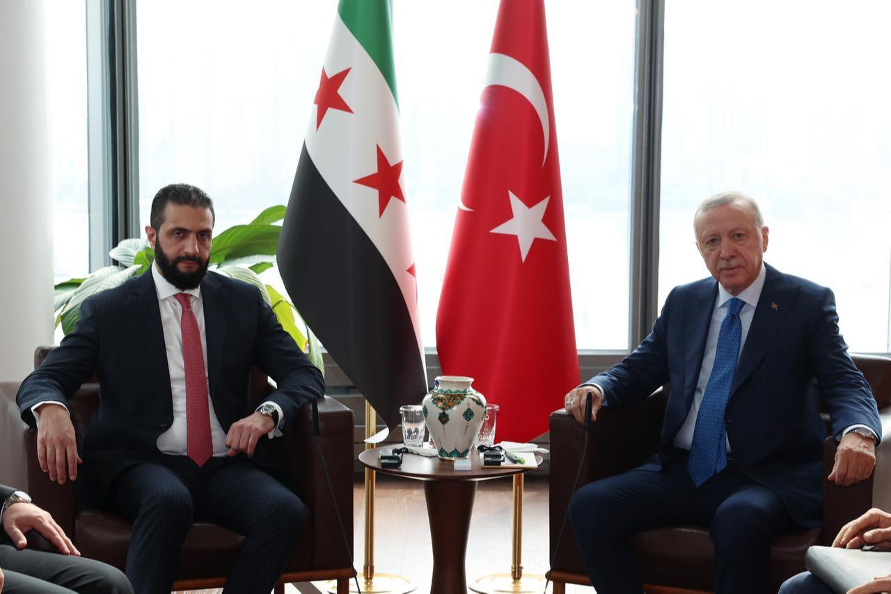 President Recep Tayyip Erdogan (R) meets with Syrian President Ahmad al-Sharaa (L) at the Turkish House (Turkevi) in New York, as part of his visit to the United States for the 80th United Nations General Assembly on Sep. 24, 2025. (Turkish Presidency / AA Photo)