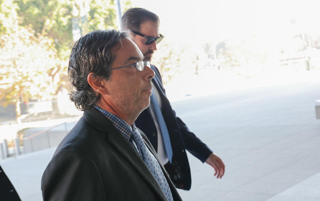 Former medical doctor Mark Chavez and his attorney Matthew Binninger arrive for his sentencing on charges of conspiracy to distribute ketamine connected to the overdose death of actor Matthew Perry at the United States District Court in Los Angeles, California, on December 16, 2025. (AFP Photo)