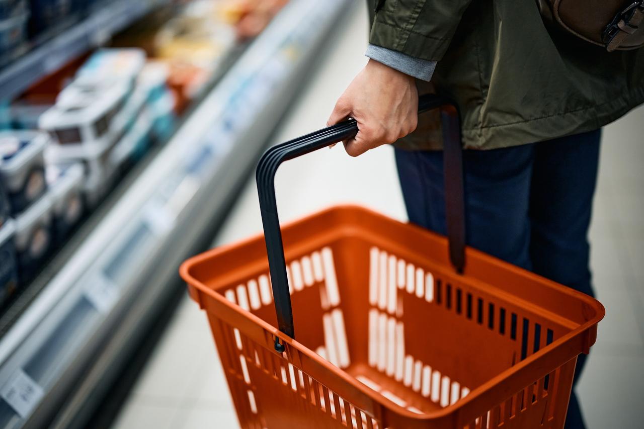 File photo shows a close-up of a person shopping in a grocery store aisle, accessed on February 15, 2025. (Adobe Stock Photo)