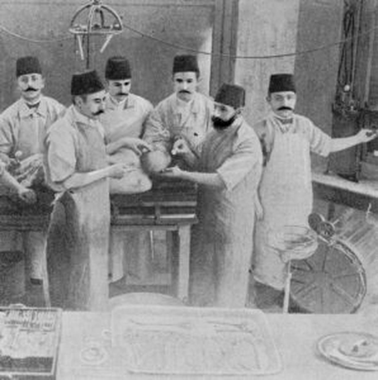 Ottoman doctors are seen during a medical operation in 1895 at an unknown location. (Photo credit: Heritage Times)