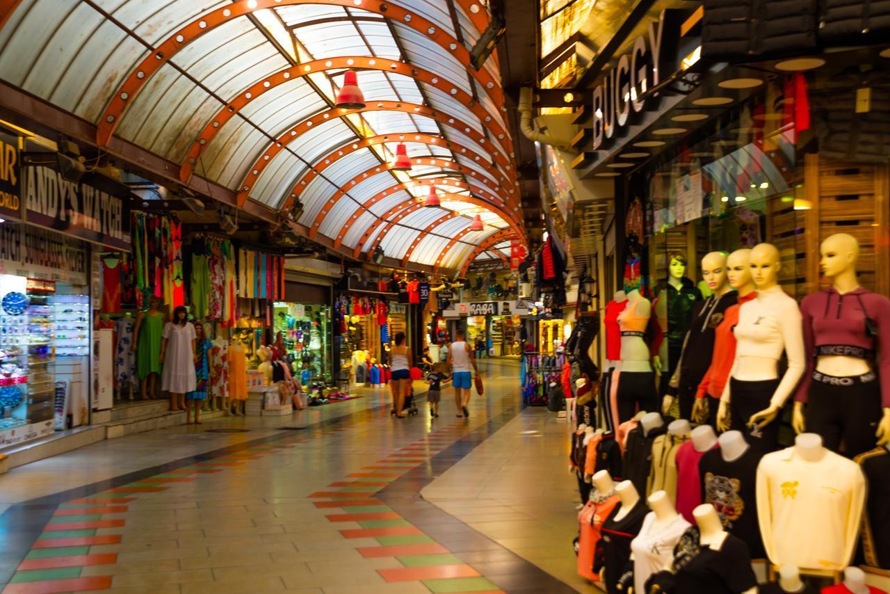 A traditional tourist street with shopping malls and sales in Marmaris, Mugla, Türkiye, at an unspecified time. (Adobe Stock Photo)