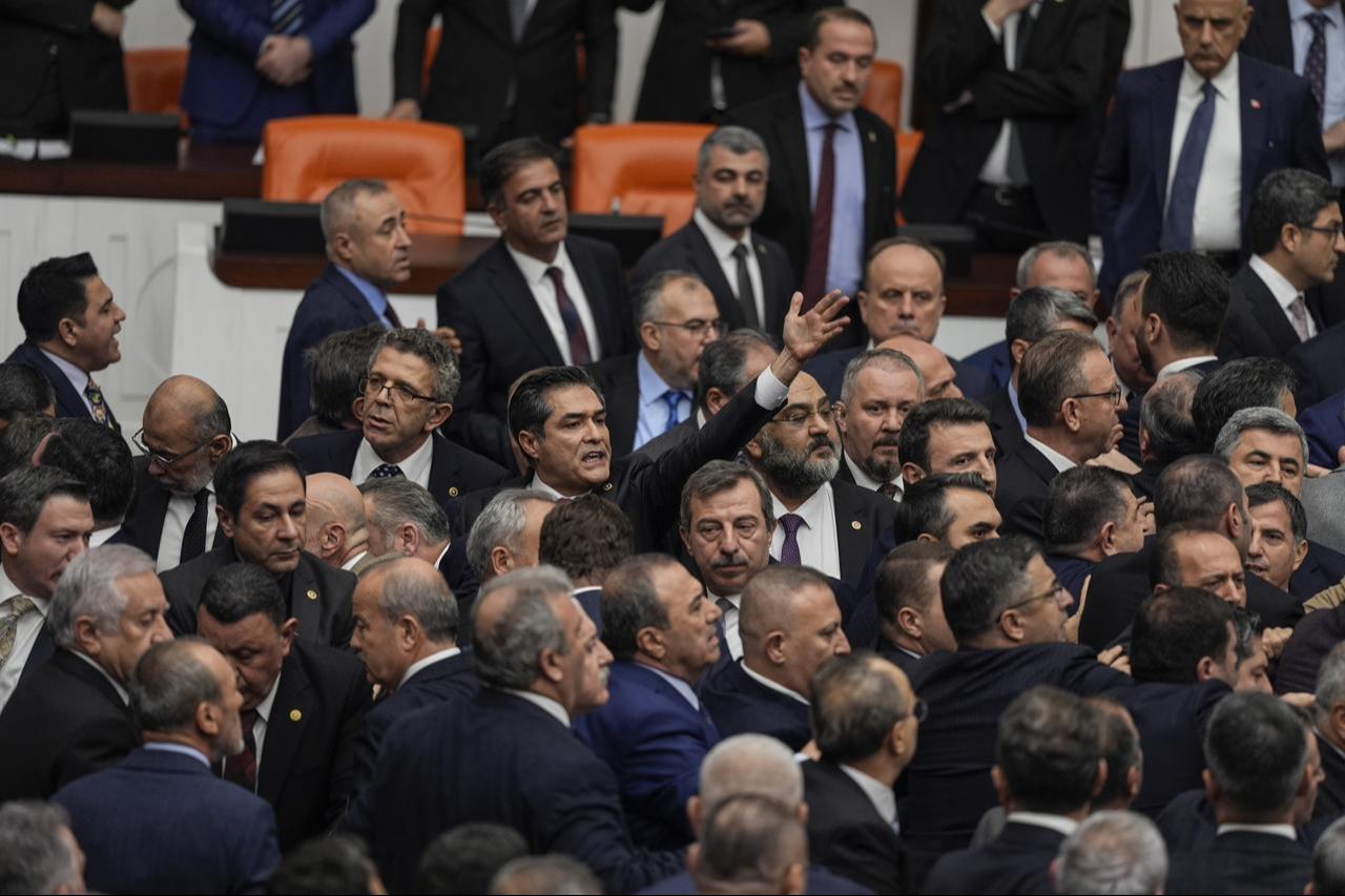 Lawmakers scuffle during the final day of 2026 budget talks at the Turkish parliament, chaired by Speaker Numan Kurtulmus, in Ankara, Türkiye, Dec. 21, 2025. (AA Photo)