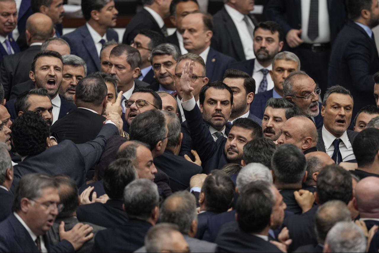 Lawmakers scuffle during the final day of 2026 budget talks at the Turkish parliament, chaired by Speaker Numan Kurtulmus, in Ankara, Türkiye, Dec. 21, 2025. (AA Photo)