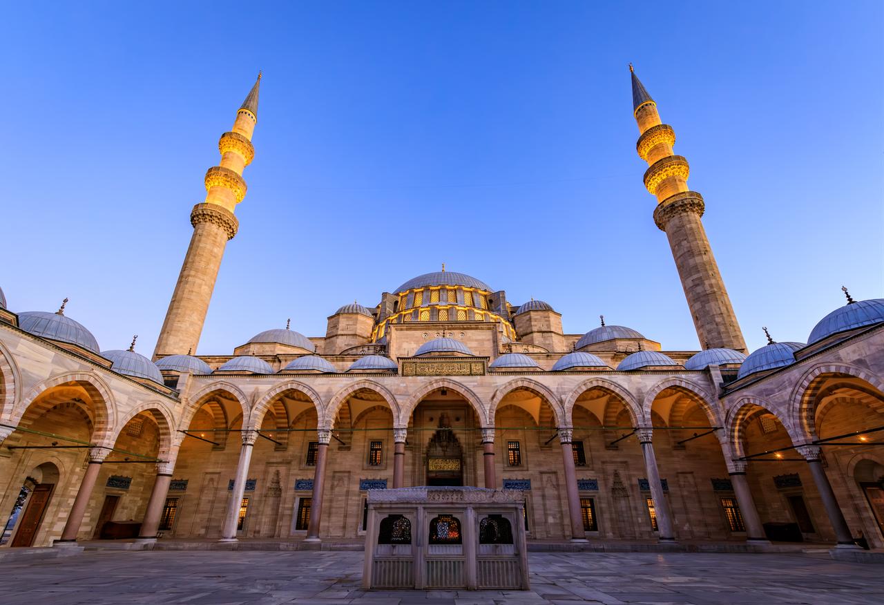 The grand dome and minarets of the Suleymaniye Mosque in Istanbul, designed by Ottoman master architect Mimar Sinan. (Adobe Stock Photo)