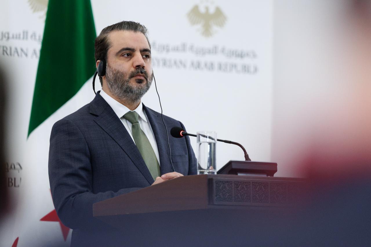 Syrian Foreign Minister Asaad Hassan al-Shaibani and Foreign Minister Hakan Fidan (not seen) hold a joint press conference after their meeting in Damascus, Syria on Dec. 22, 2025. (AA Photo)