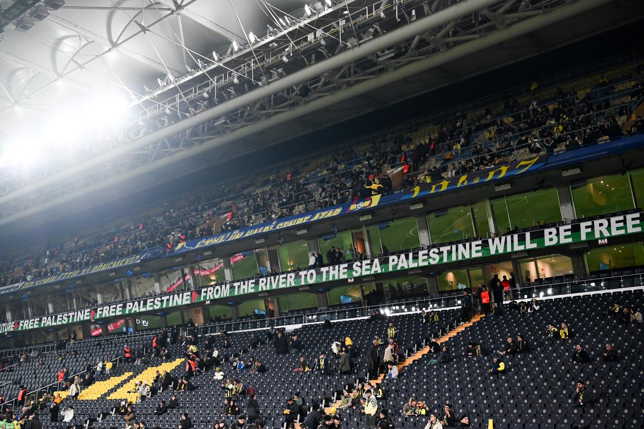 Fenerbahce supporters display banners reading “Free Palestine" and "From the River to the Sea, Palestine Will Be Free” during the Ziraat Turkish Cup Group C first-week match between Fenerbahce and Besiktas at Chobani Stadium in Istanbul, Türkiye, on Dec. 23, 2025. (AA Photo)