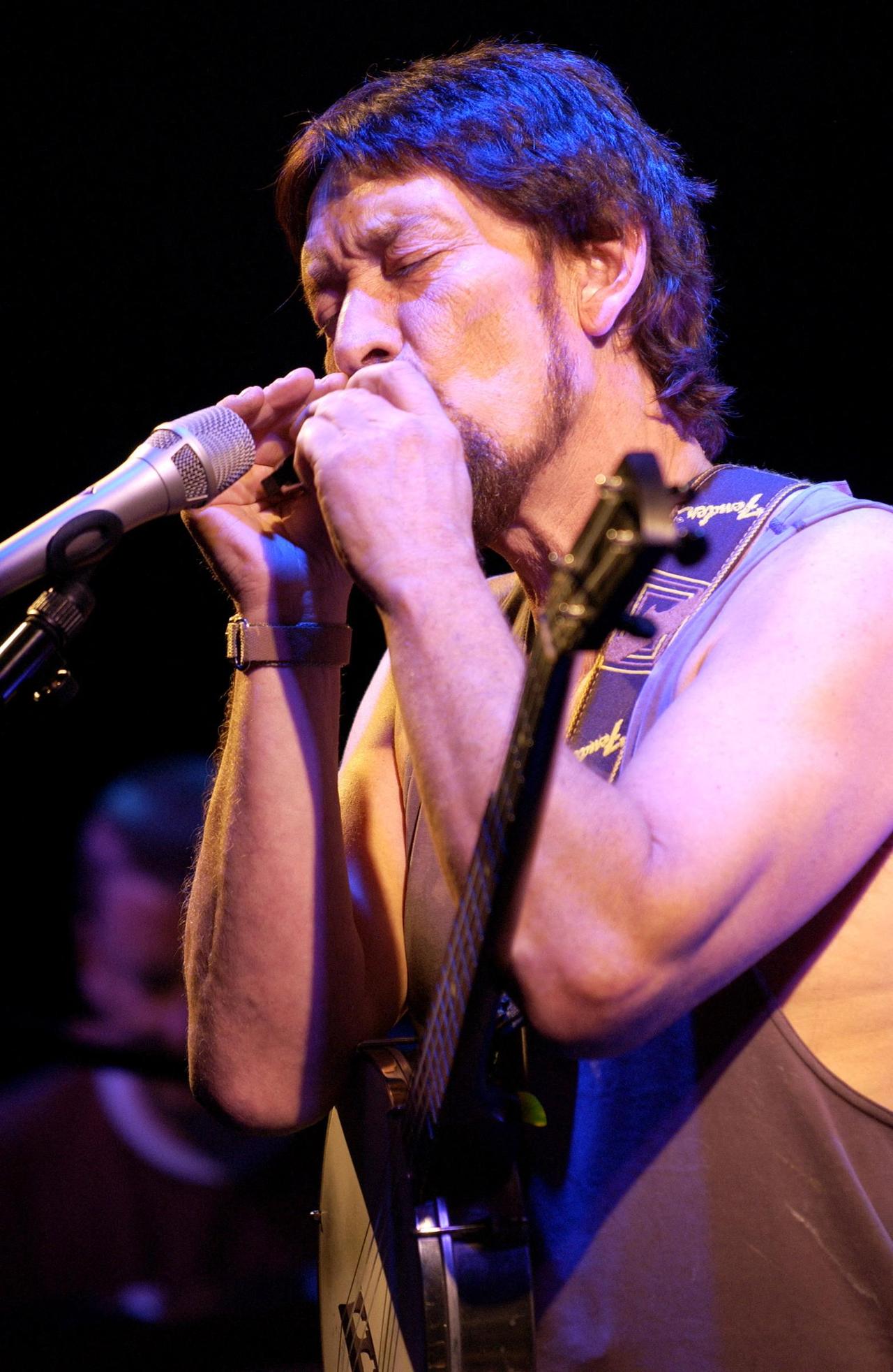 British singer Chris Rea on stage during a performance at the Cigale Theatre. Paris, France, May 19, 2004. (AFP Photo)