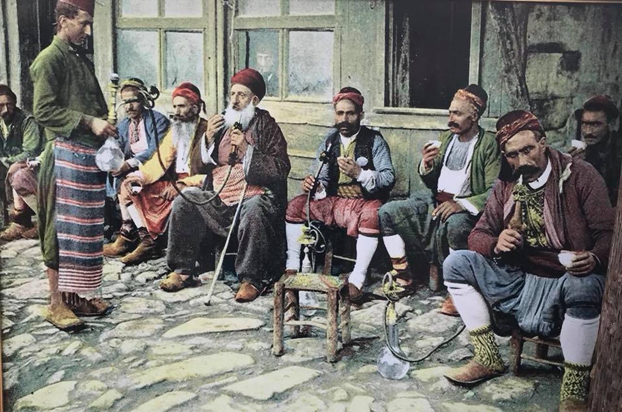 Men smoking hookah in front of a coffeehouse, Istanbul, Türkiye, 1898. (Photo via Flickr)