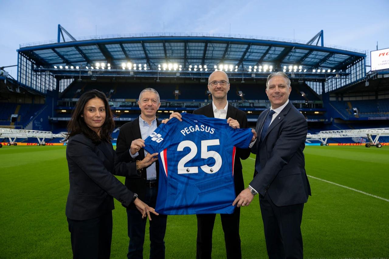 Representatives from Pegasus Airlines and Chelsea Football Club hold a Chelsea jersey for their new global partnership at Stamford Bridge in London, UK. (Photo via chelseafc.com)