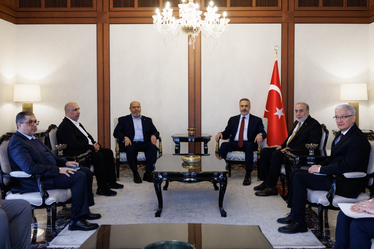 Turkish Foreign Minister Hakan Fidan (3rd R) meets with a Hamas delegation led by Hamas Political Bureau member Khalil al-Hayya (3rd L) in Ankara, Türkiye, Dec. 24, 2025. (AA Photo)
