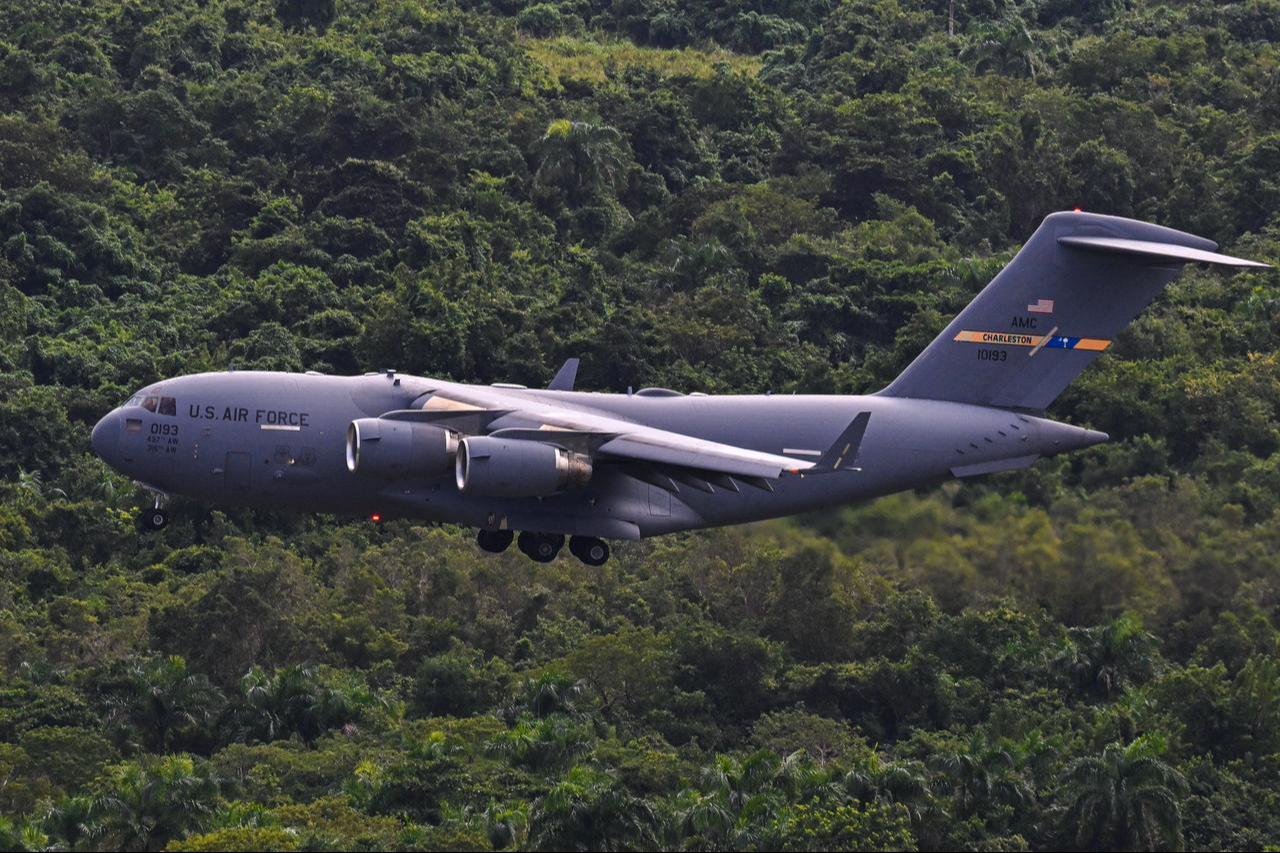 A Boeing C-17 Globemaster prepares for landing at José Aponte de la Torre Airport, formerly Roosevelt Roads Naval Station, on December 17, 2025 in Ceiba, Puerto Rico. (AFP Photo)
