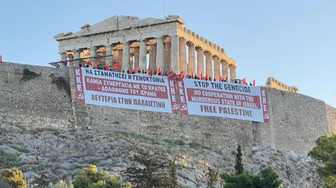 Pro-Palestinian banners hang from the Acropolis during a protest calling for an end to the war in Gaza and cooperation with Israel, Athens, Greece, September 19, 2025. (Courtesy of Ynet)