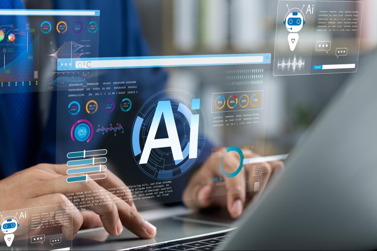 Businessmen use artificial intelligence AI technology for enhanced work efficiency data analysis and efficient tools, unlocking work potential with AI solutions chatbot help solve work problems, date and time undisclosed. (Adobe Stock Photo)