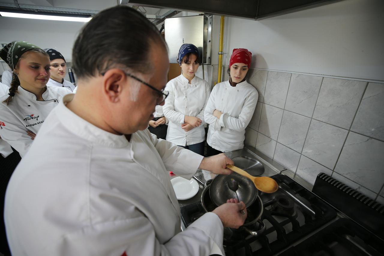 Sedat Kocadogan and his students are seen recreating centuries-old Mevlevi recipes based on the 19th-century manuscript written by Ali Esref Dede, Dec. 25, 2025. (AA Photo)
