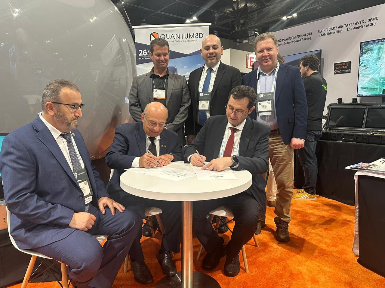 Officials from Türkiye's Havelsan and US-based Advanced Rotorcraft Technology, Inc. (ART) are signing the strategic partnership agreement. (AA Photo)