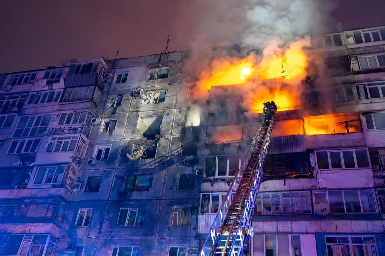 Units of the State Emergency Service of Ukraine (SES) extinguish after a Russian airstrike in Zaporizhzhia, Ukraine, December 16, 2025. (Photo via Zaporizhzhia Regional Military Adm.)