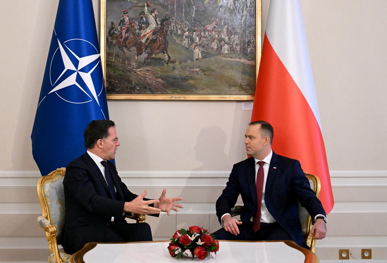 Poland's President Karol Nawrocki (R) and NATO Secretary General Mark Rutte (L) have taken seat for talks at the Presidential Palace in Warsaw, Poland on Dec. 18, 2025. (AFP Photo)