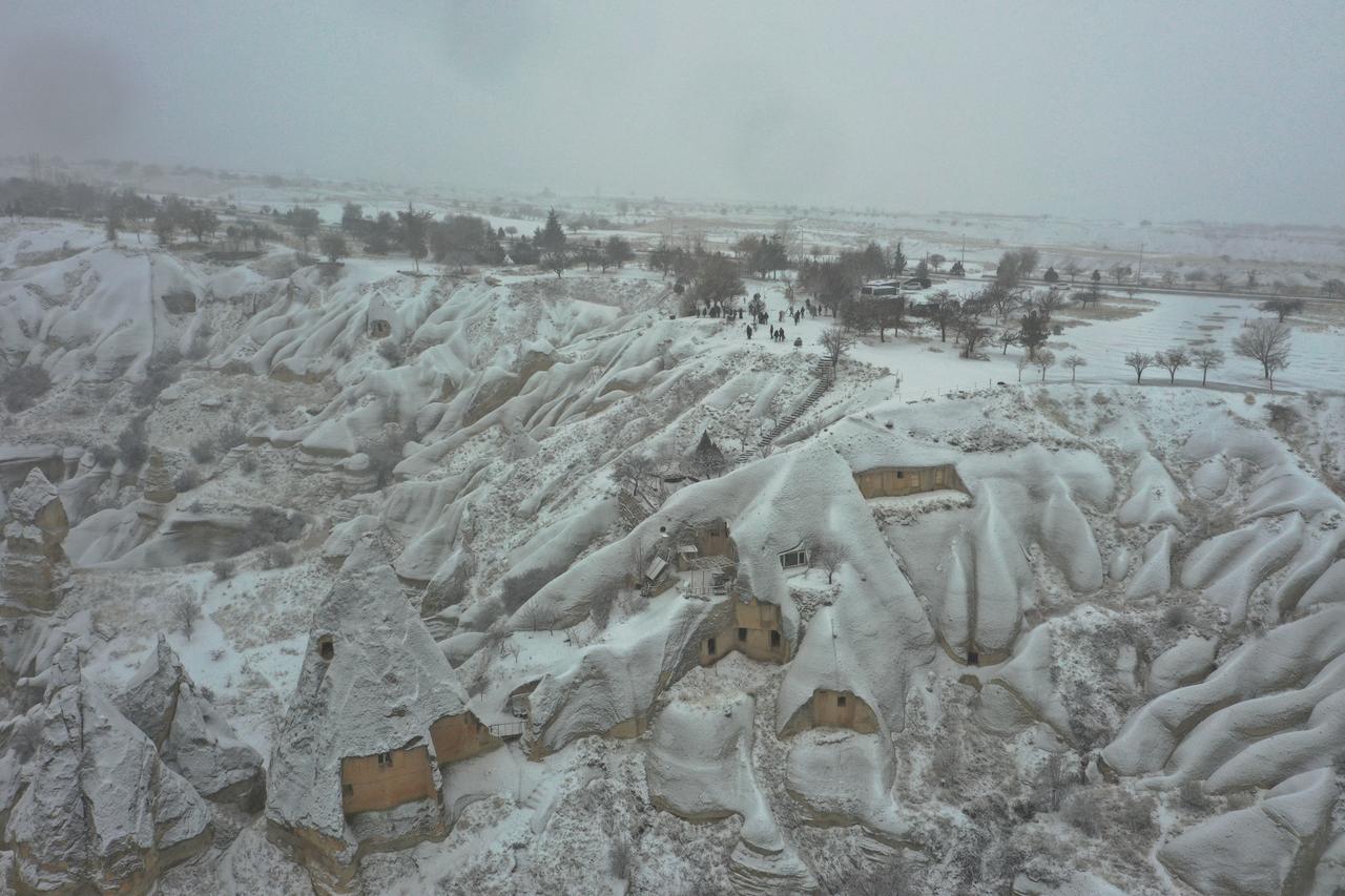 Snow blankets Cappadocia’s fairy chimneys after winter storm 