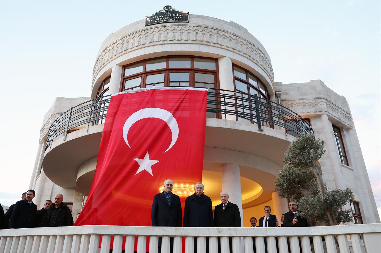 Turkish President Recep Tayyip Erdogan accompanied by Turkish Parliament Speaker Numan Kurtulmus, MHP Chairman Devlet Bahceli, Hatay Governor Mustafa Masatli and the official delegation visit the historic building that is restored under the authority of the Hatay Governorship and previously served as the parliament building, in Hatay, Türkiye on Dec. 27, 2025. (AA Photo)