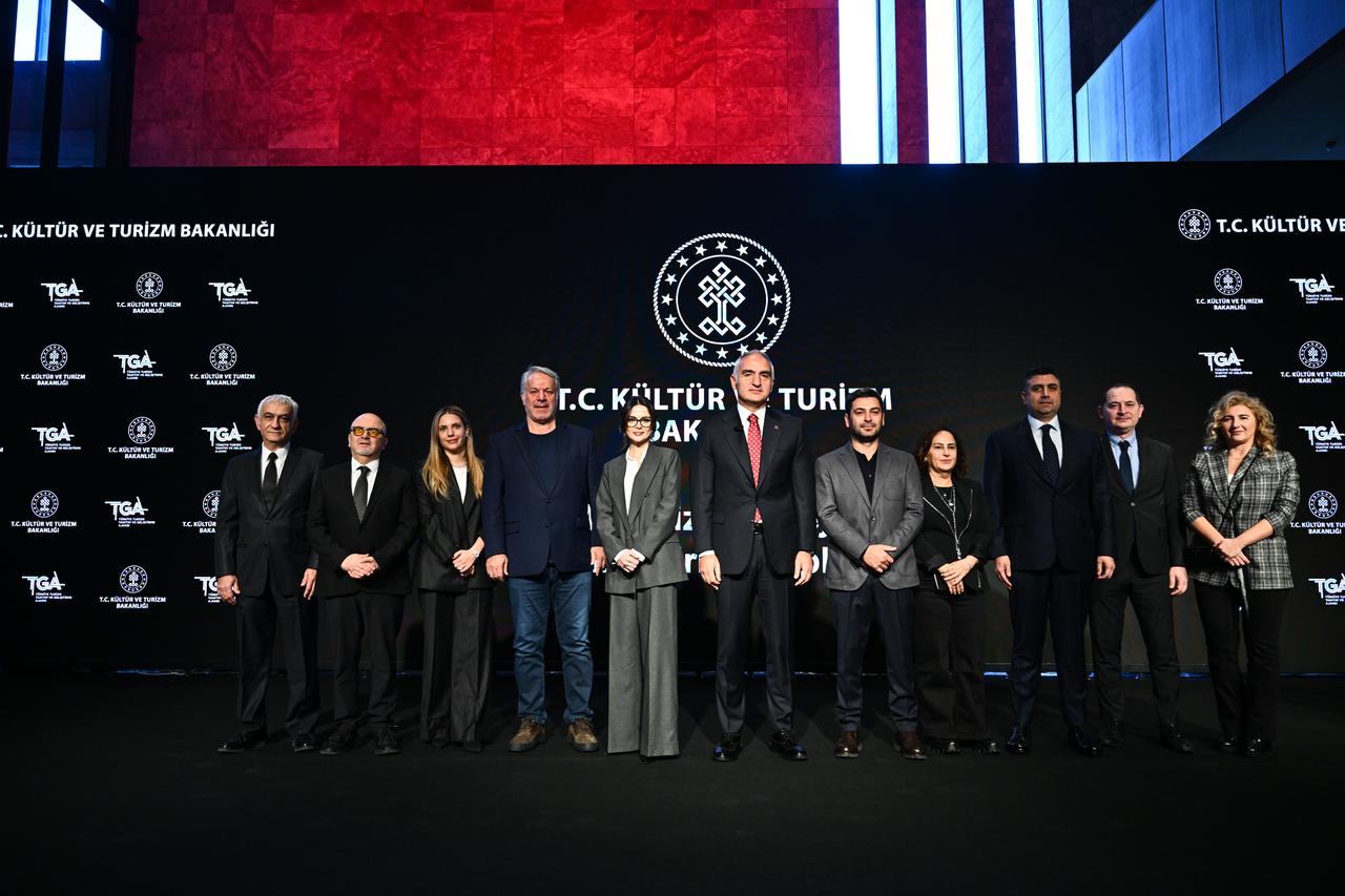 The press conference held at the Ataturk Cultural Center regarding the series prepared under the coordination of the Türkiye Tourism Promotion and Development Agency (TGA) and the contribution of the mini-series projects to the country’s promotion was attended by Minister of Culture and Tourism Mehmet Nuri Ersoy (center), actor Ozan Akbaba (fifth from right), Director General of Cinema at the Ministry of Culture and Tourism Birol Guven (second from left), actress Sinem Unsal (fifth from left), actress Eda Ece (third from left), and producer Fatih Aksoy (second from right). Istanbul, Türkiye, December 26, 2025. (AA Photo)