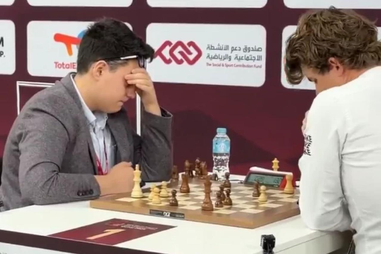 Photo shows Turkish national chess player Yagiz Kaan Erdogmus competing with world No. 1 Magnus Carlsen at the World Rapid and Blitz Chess Championship, in Doha, Qatar, accessed on Dec. 28, 2025. (Photo via X)