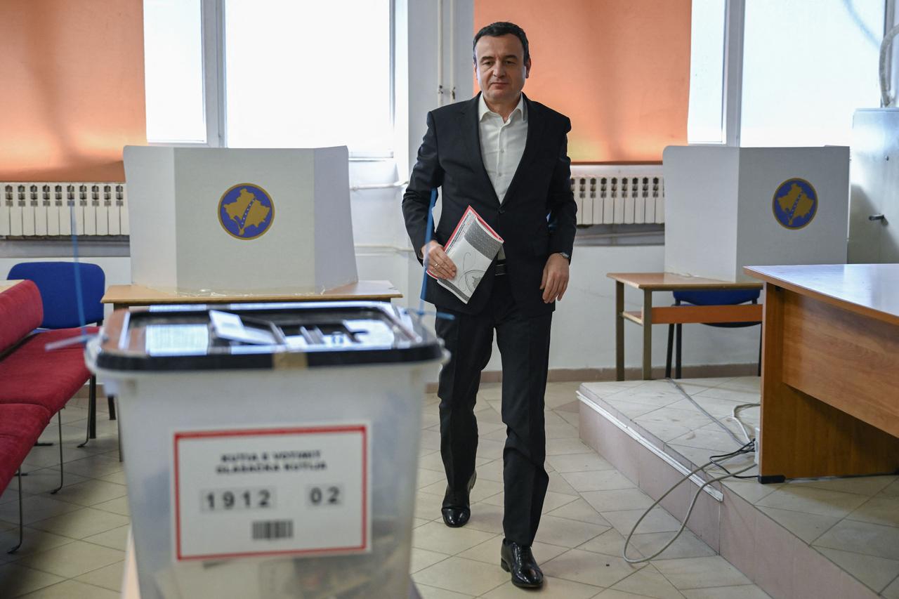 Exit polls show caretaker PM Kurti’s party leads Kosovo snap vote