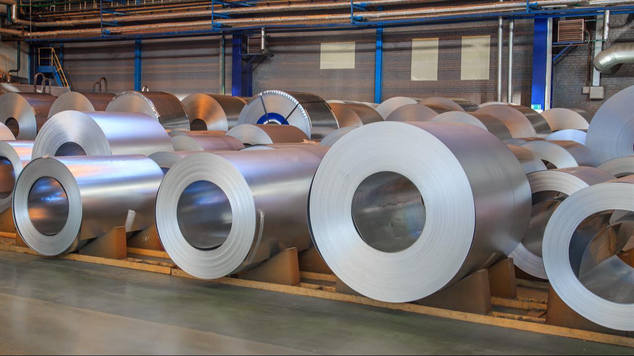 Cold-rolled stainless steel coils stored in a production facility. (Adobe Stock Photo)