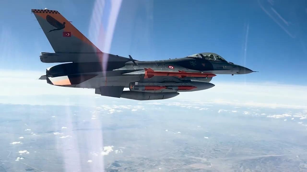 Turkish Air Force Command's F-16 fighter jet carrying Aselsan's Tolun munition during a test firing at an undisclosed location and time. (Photo via X/@aselsan)